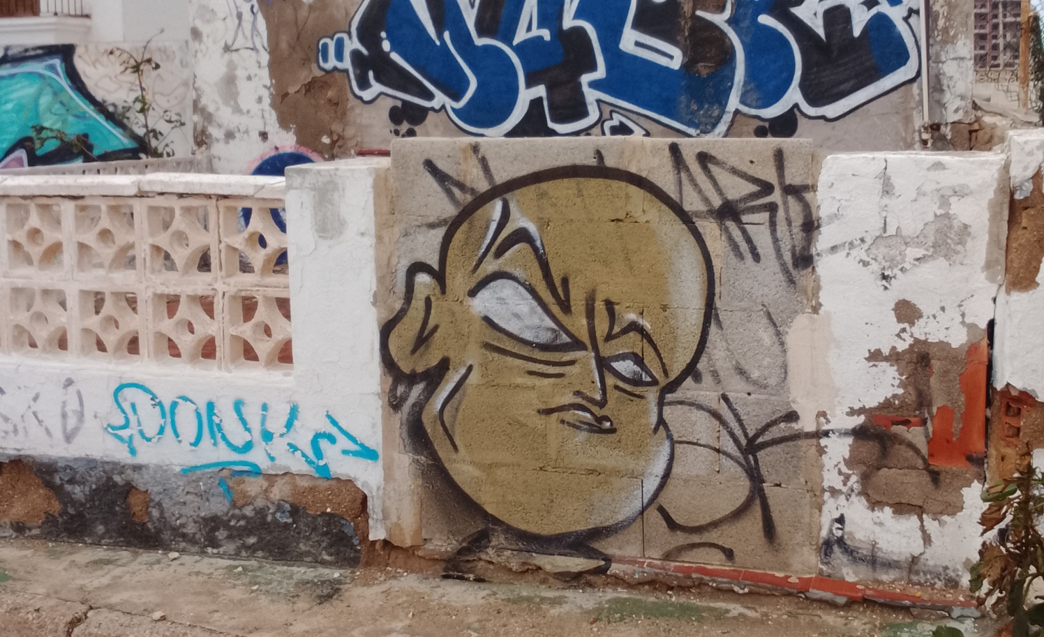 Homonculous graffiti on wall in Spain
